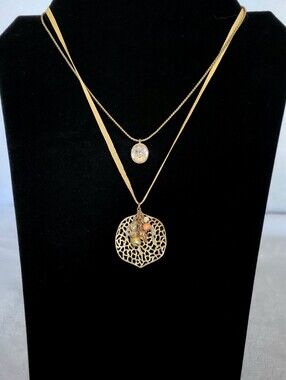 ​Layered Gold Tone Rhinestone Ribbon Necklace With Filigree Leaf Pendant